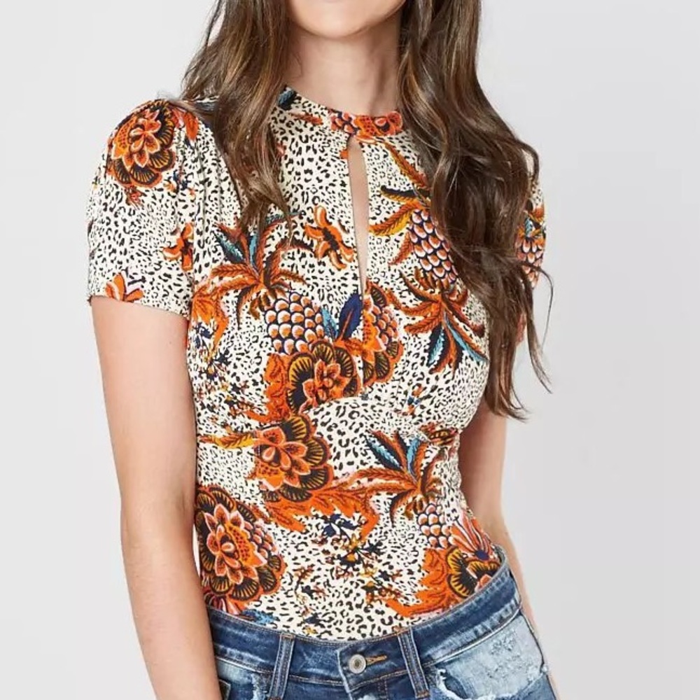 Free People Hear Me Roar cheetah floral keyhole jersey top
